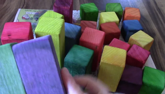 Rinse the blocks under running water to remove excess dye and reduce color transfer.