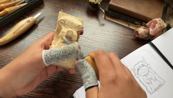 Refine the overall shape, removing excess wood and paying attention to detail.