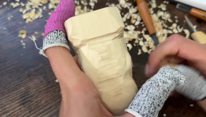 Add texture to the hair using horizontal indents.