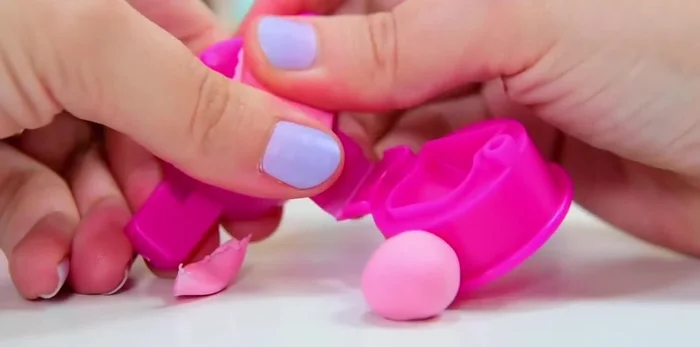 Fill the molds: Gently press the clay balls into the designated 3D molds. Ensure a smooth surface for best results.