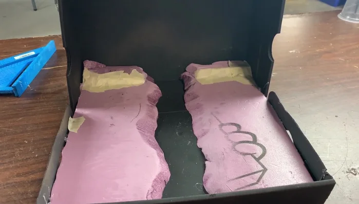 Glue the styrofoam base into the shoebox.