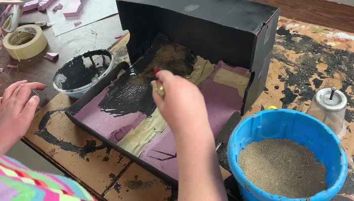 Mist with rubbing alcohol to help set the grit.