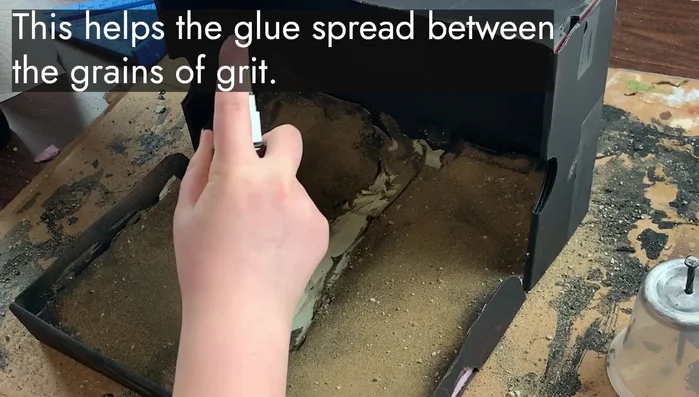 Mist with rubbing alcohol to help set the grit.