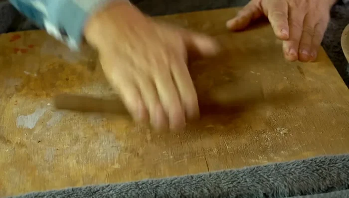 Pinch the seam where the coil joins the base to create a strong bond.