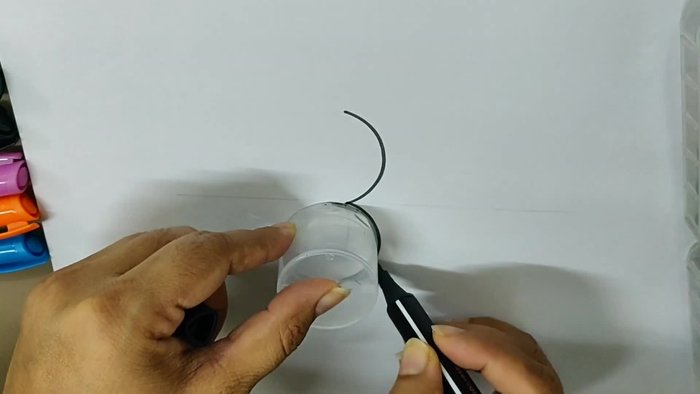 Draw another triangle inside the larger circle, slightly overlapping the smaller triangle.