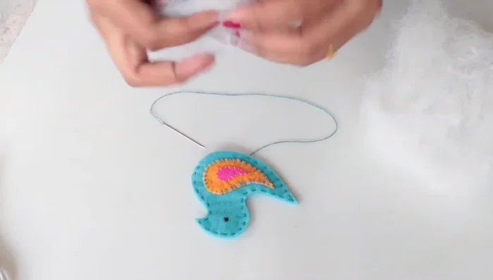 Stuff the bird with poly-fill or cotton.