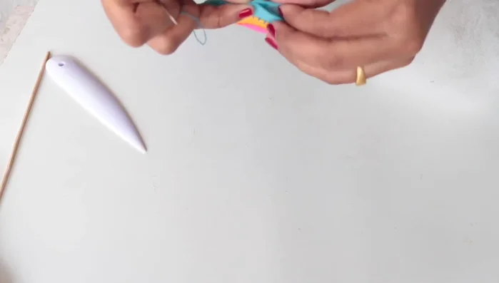 Close the opening with a running stitch.