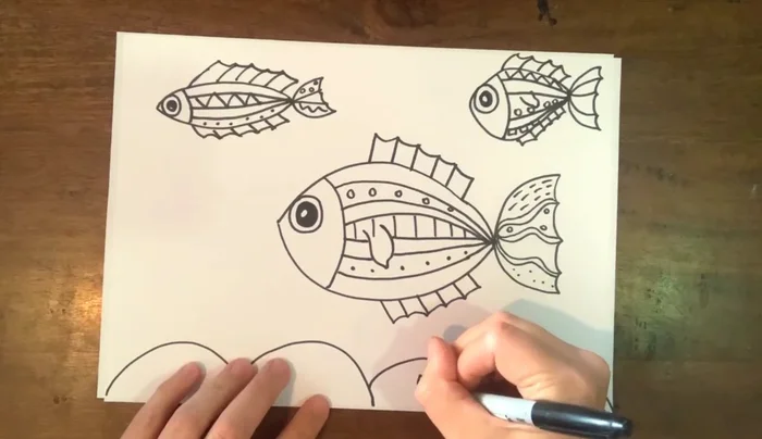 Add shells and starfish to the ocean floor.