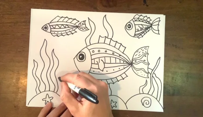 Draw coral: up and around, creating organic shapes.