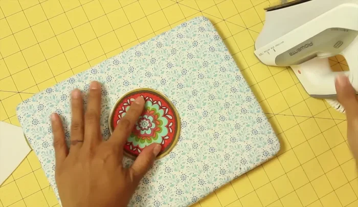 Fuse one fabric circle to the interfacing.