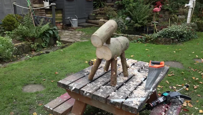 Glue the head (with the neck attached) to the body.