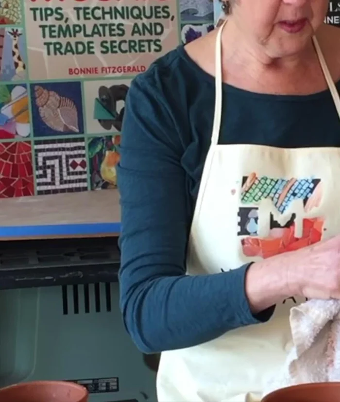 Clean up excess adhesive with a damp towel.