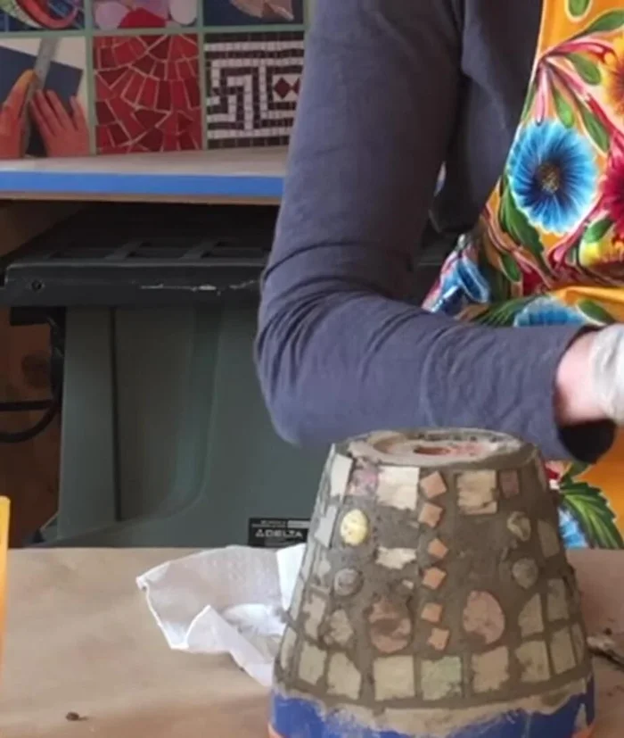 Optional: Clean excess grout with a damp sponge.