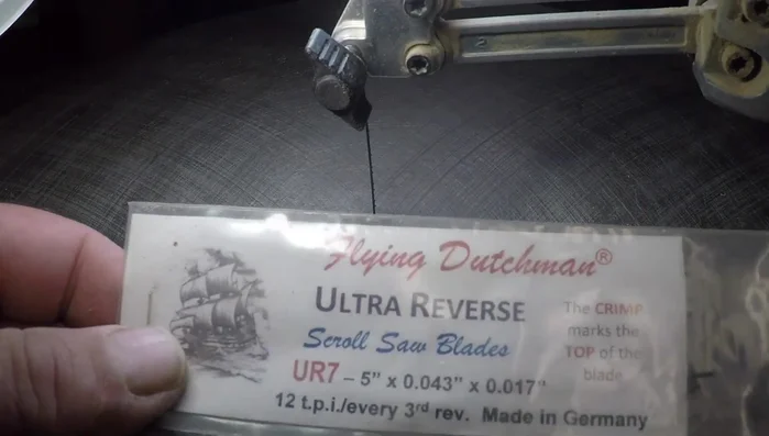 Use a router (Flying Dutchman Ultra Reverse UR7) to cut out the name from the stencil.