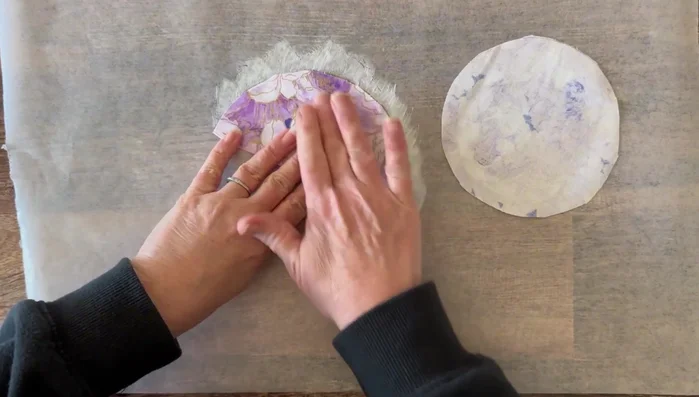 Glue the Mod Podge-coated halves of the circles together, print sides facing out. Let it dry.