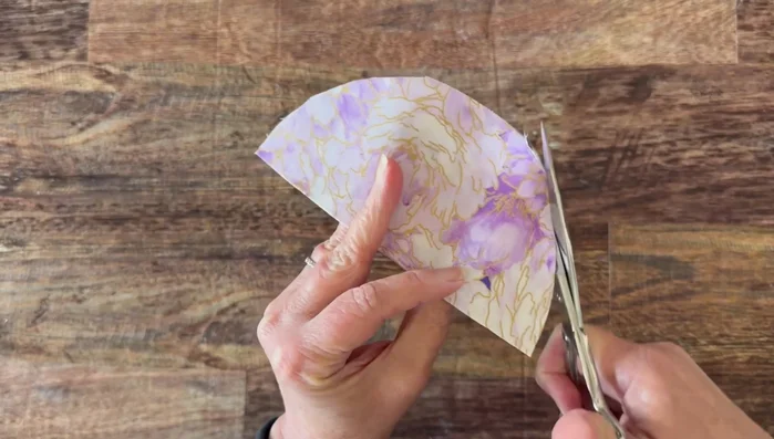 Pinch the center of each circle to create pleats.