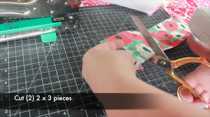 Make four pockets for the dowels using iron-on interfacing and fabric strips. Sew the pockets to the fabric kite leaving one side open to insert the dowels.