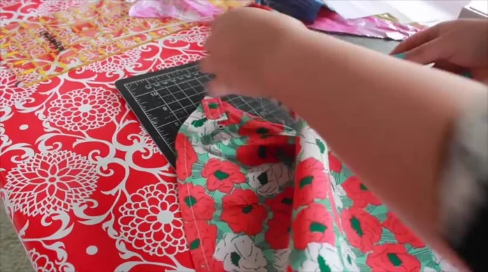 Attach the string, clipping it higher towards the top for better lift.