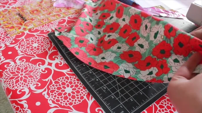 Attach the string, clipping it higher towards the top for better lift.