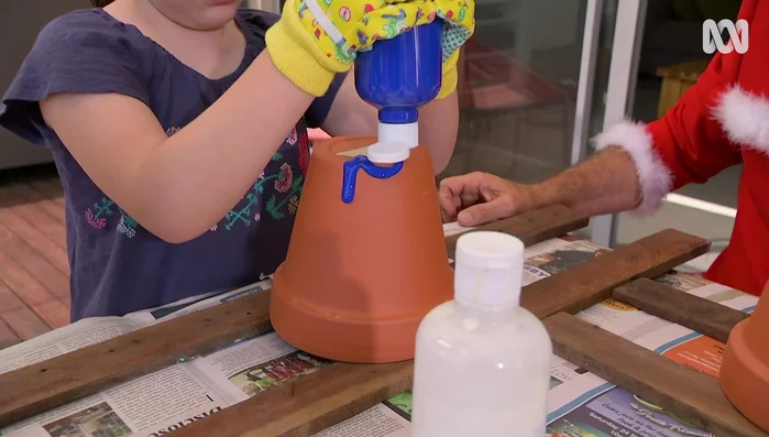Shift the pots out of paint puddles before it dries.