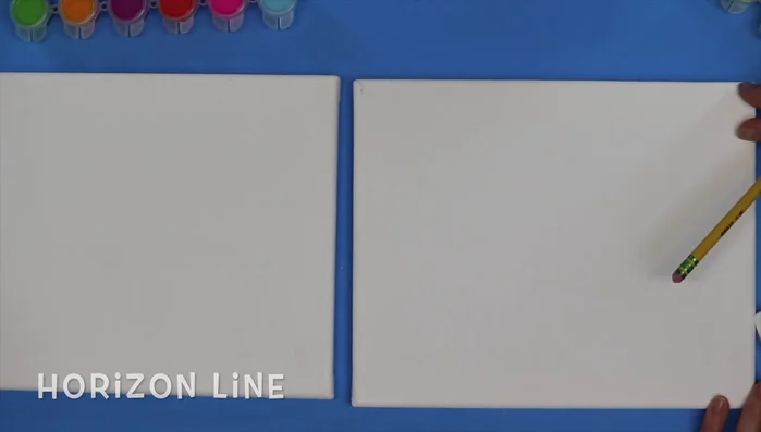 Draw the smallest hot air balloon in the background, making it appear furthest away.