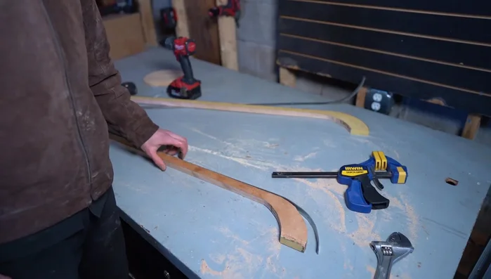 Attach the steel to the supports using nails.