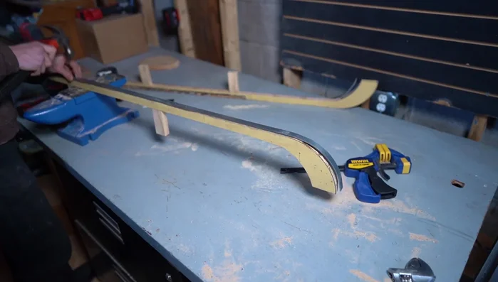 Attach the steel to the supports using nails.