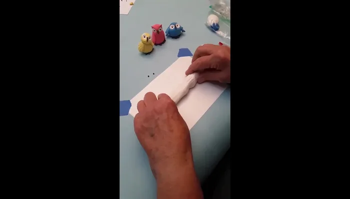 Mix Clay Colors: Mix white Model Magic with desired colors (red, yellow, blue) to create colored clay for owl bodies. Keep in plastic bags.