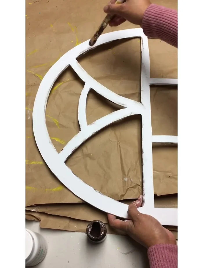 Add a rustic look by smearing brown paint around the edges.