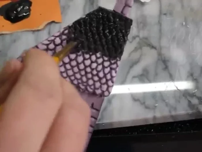 Paint all the parts that have lines (bricks, stones, etc.) with a thick layer of black wash. Allow it to run into the grooves to enhance depth.