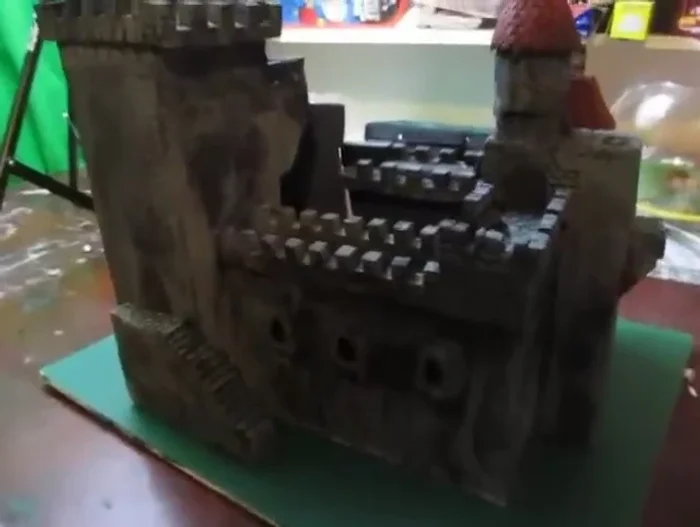 Glue the castle onto a painted foam board base (green in this case).