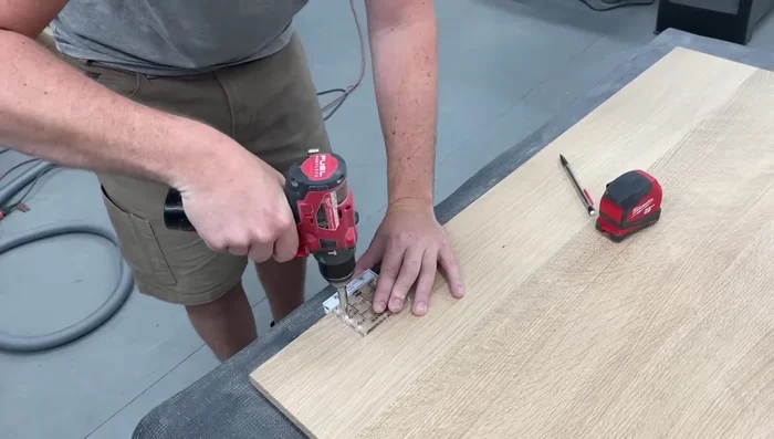 Finish the lid and install torsion hinges using a jig for easier installation. Add a third hinge for heavier white oak lid.