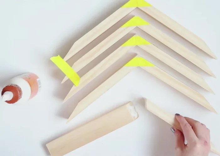 Assemble the star using wood glue and tape to secure the 36-degree angled cuts, then the 18-degree cuts.