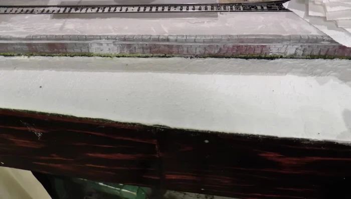 Create waves: Use a brush to push and shape the toilet paper into wave formations. Place optional objects to shape waves around them.