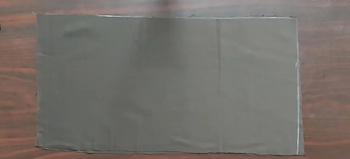 Create drawstring closure: Cut two rectangular pieces of fabric (19 inches x 10 inches). Fold edges, stitch, and create loops for drawstring.