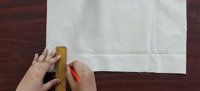 Cut fabric based on interfacing markers.