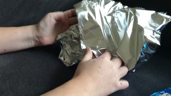 Create a foil ball base by rolling up a sheet of foil into a tight ball and adding layers for stability.
