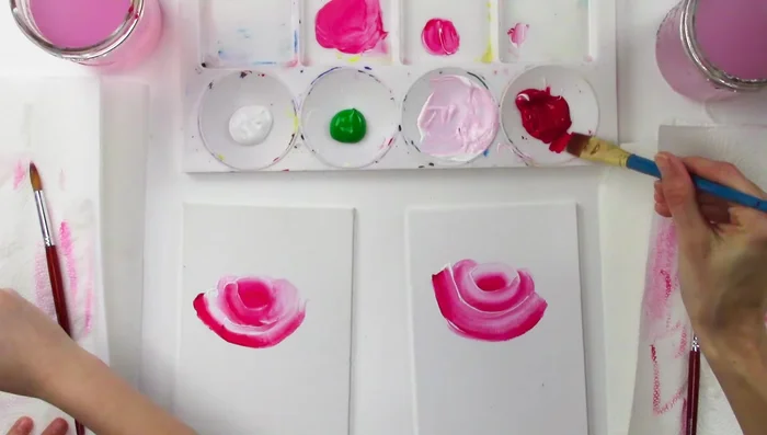 Use a flat brush with red to thicken the base of the rose.