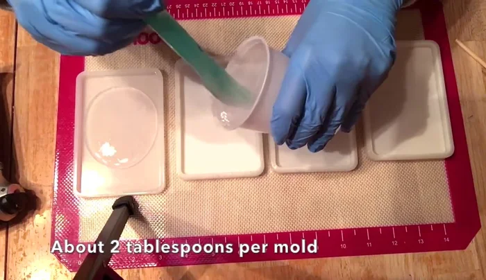 Use a flame torch or cigarette lighter to remove air bubbles from the resin.