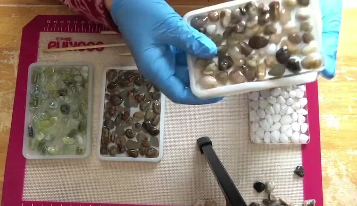 Unmold the soap dishes and carefully remove any excess resin with wet sandpaper and a mask.