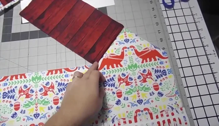 Sew the exterior fabric pieces together, leaving the bottom open. Attach the roof pieces.