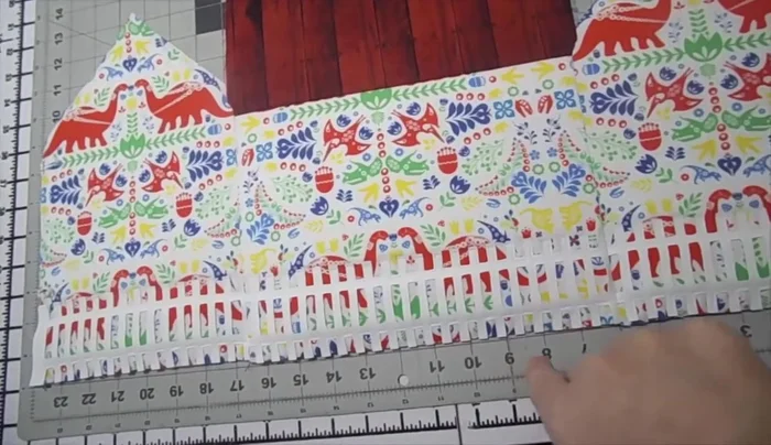 Sew the side pieces to the back piece, adding elastic straps for closure.