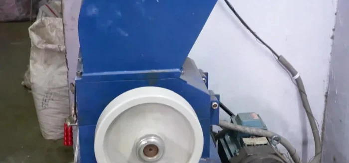 Grind scrap material and reuse it to make more products.