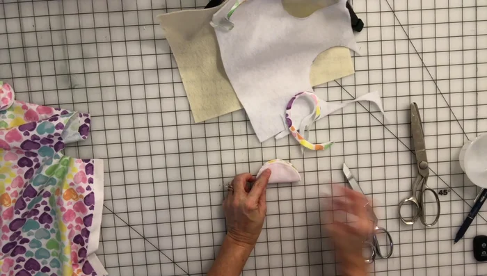 Fold the sewn circle in half, then in half again to find the center. Mark the center (optional).