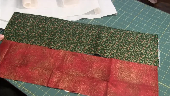 Cut fabric squares: Cut squares of your chosen size (e.g., 5 inches) with a bit of extra fabric for trimming. Cut matching Heat and Bond slightly smaller.