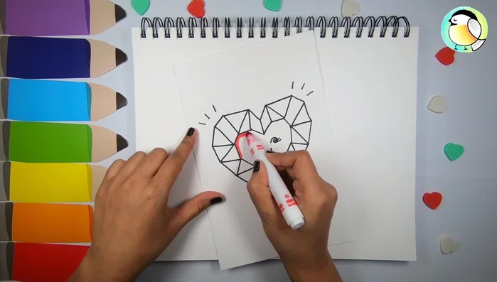 Fill alternate segments of the outer heart with red, using lighter and darker shades for variation.