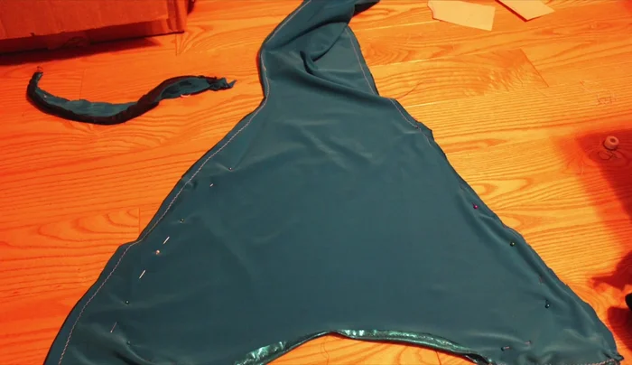 Attach monofin: Place the monofin inside the tail, pin for fit, and sew around it, leaving the bottom open.