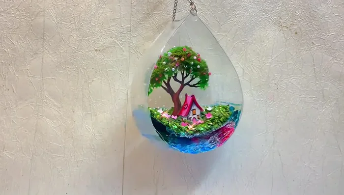 Optional: Attach a small chain (from an old keychain) to the decor.