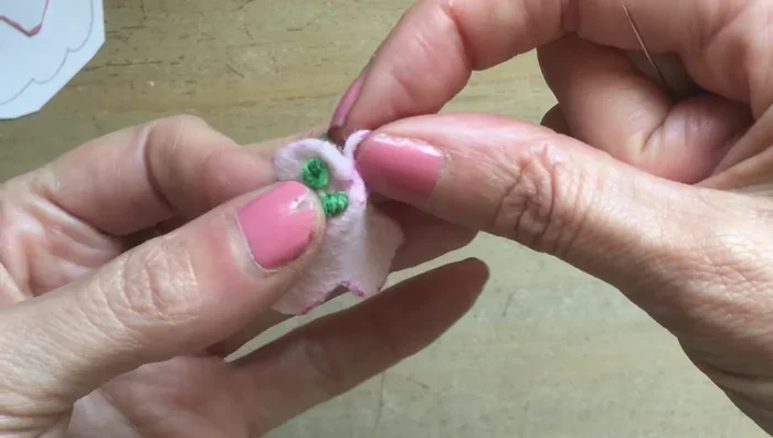 Cut out the felt for the base of the teacups and glue it to the base of each cup.