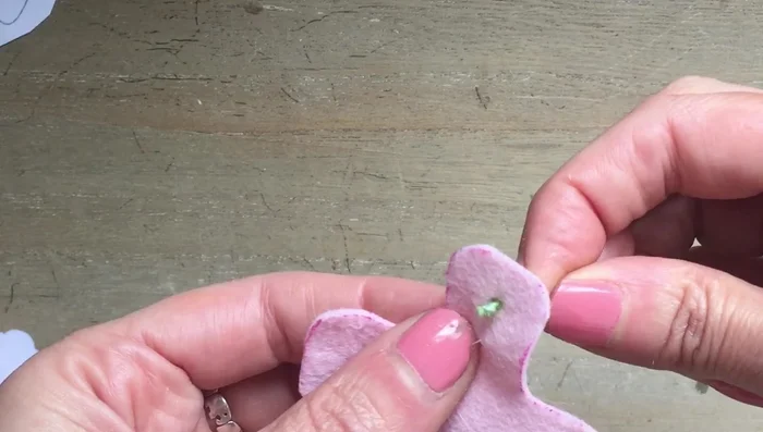 Use an all tool or thin scissors to make a hole for the spout.